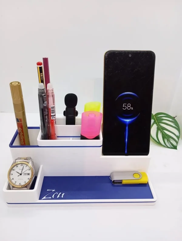 Organizador Zen en blanco y azul con soporte para móvil y espacios para accesorios de oficina.